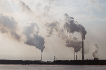 Smoke from the pipes of the factory