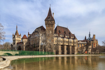 Fototapeta premium Sunset over Vajdahunyad Castle in the City Park of Budapest, Hungary