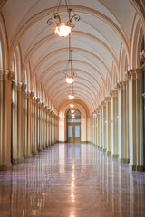 ancient white corridor with arch in budapest