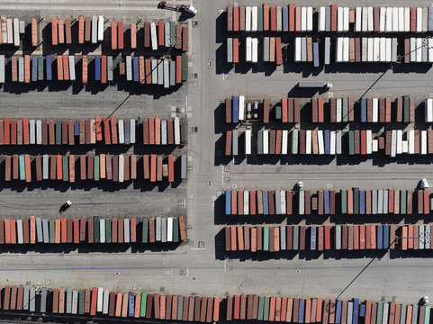 Aerial view trains in sunny shunting yard, Los Angeles, California, USA
