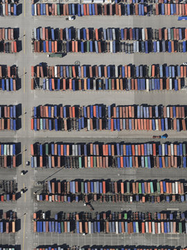 Aerial view trains in sunny shunting yard, Los Angeles, California, USA