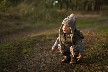 Cute girl playing with sticks