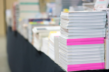 Stack books and magazines on table.  Book festival concept.