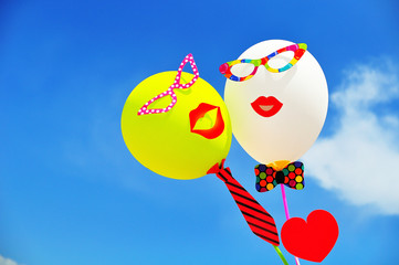 colorful balloons with face in love