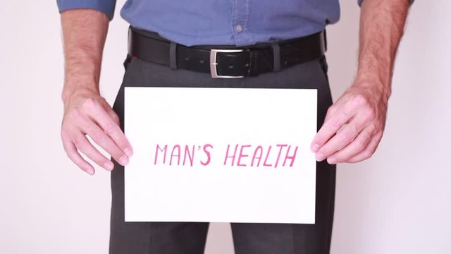 "Man's Health" inscription below the belt
