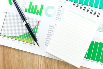 Pen with Data Business Graphs finance Chart document.