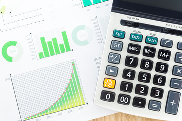 Calculator with Business Graphs finance document.	