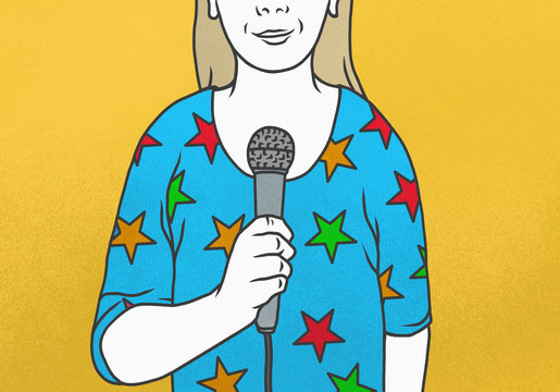 Woman wearing star-shaped shirt talking into microphone