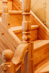 Fototapeta na wymiar Вetail of wooden stairs