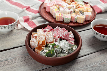 Turkish delight on a wooden table.