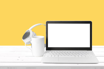 Fototapeta premium New headphones and laptop on the table