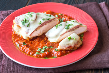 Chicken with pepperoni and tomato sauce