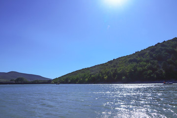 Sukko Lake. Krasnodar region. Russia. View of the unique cypresses and wooded slopes of the mountains.