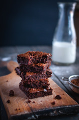 Close-up of homemade chocolate brownies on cutting board