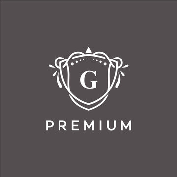 Luxury G Initial Logo frame symbol, Luxury and graceful floral monogram design dark background