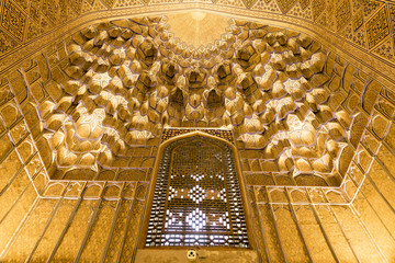 Amir Temur (Tamerlan) tomb in Samarkand, Uzbekistan. Wall's and ceiling golden mosaic decoration in...