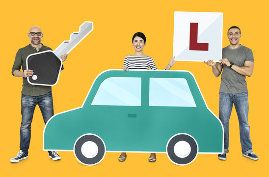 Happy new drivers with a car