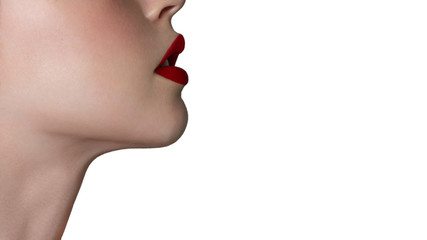 Close-up of a woman in red lipstick and skin. Plump lips with scarlet lip gloss isolated on white...
