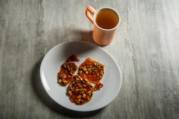 green tea and pumpkin seeds in caramelized sugar dessert