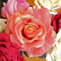 colorful fake rose flowers top view
