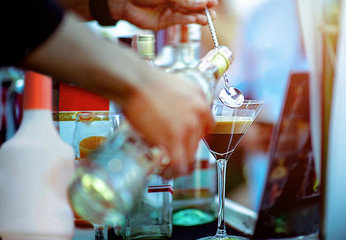 fruit cocktail glass takes pour jigger spoon drop and dip by bartender for mixing make cocktail party funny enjoy and outdoor entertainment