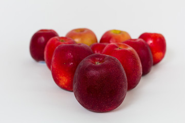 Red apples on the white background 