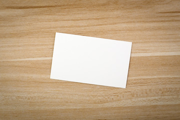 Blank Card On The Wooden Table