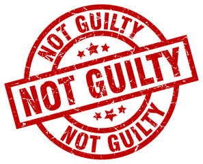 not guilty round red grunge stamp