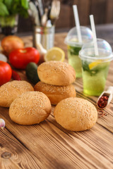 burger with meat, lettuce leaves and sauce (fast food). Sandwiches with meat. . food background. top view
