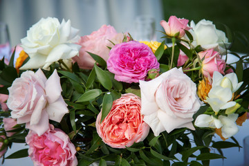 Roses on a White Table Cloth