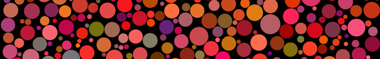 Abstract horizontal banner of circles of different sizes in shades of red colors on black background