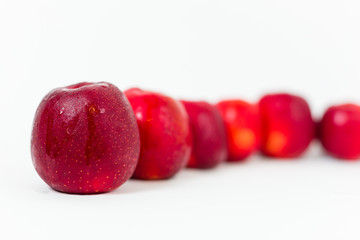 Red apples on the white background 