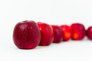 Red apples on the white background 