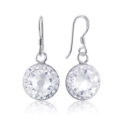 beautiful white diamon earrings with reflection on white background