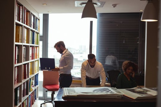 Architects working in office