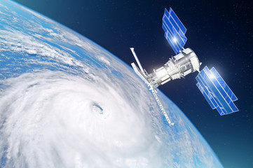 Research, probing, monitoring of tracking in a tropical storm zone, hurricane. Satellite above the...