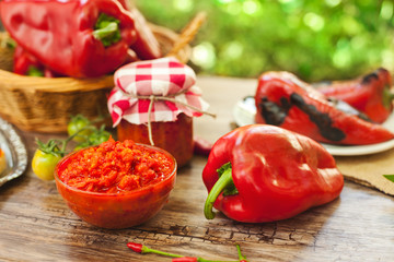 Ajvar in glass bowl with roasted pepper