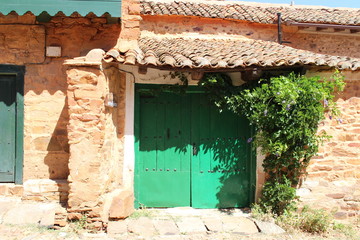 Green door in an old house.
