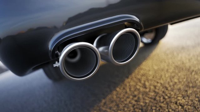 Sports Car exhaust closeup, sunny day on asphalt, pollution, power, durability.