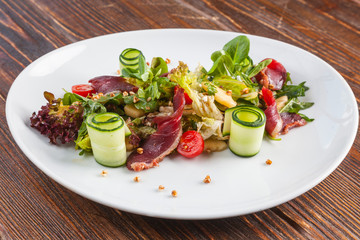 Salad with duck and vegetables
