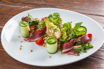 Salad with duck and vegetables