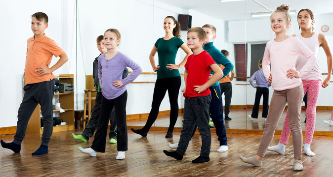 Children studying modern style dance