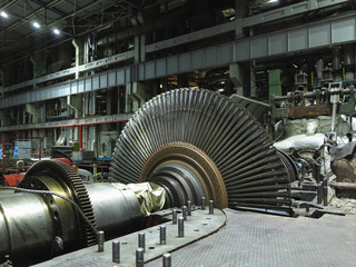 Disassembled steam turbine in the process of generator repair at power plant