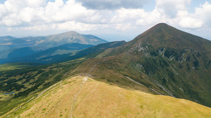 Fototapeta premium Aerial view of the footpath in the Carpathian Mountains
