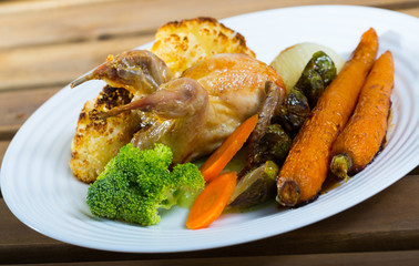 Grilled wildfowl with roasted vegetables