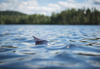 Paper ship in a Finnish lake