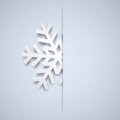 Christmas illustration with one white big snowflake which protrudes from the cut on a light blue background