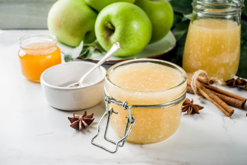 Homemade apple jam or sauce, with green apples and spices