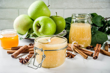 Homemade apple jam or sauce, with green apples and spices