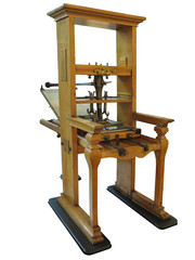 Vintage old letterpress printing manual machine isolated on white background